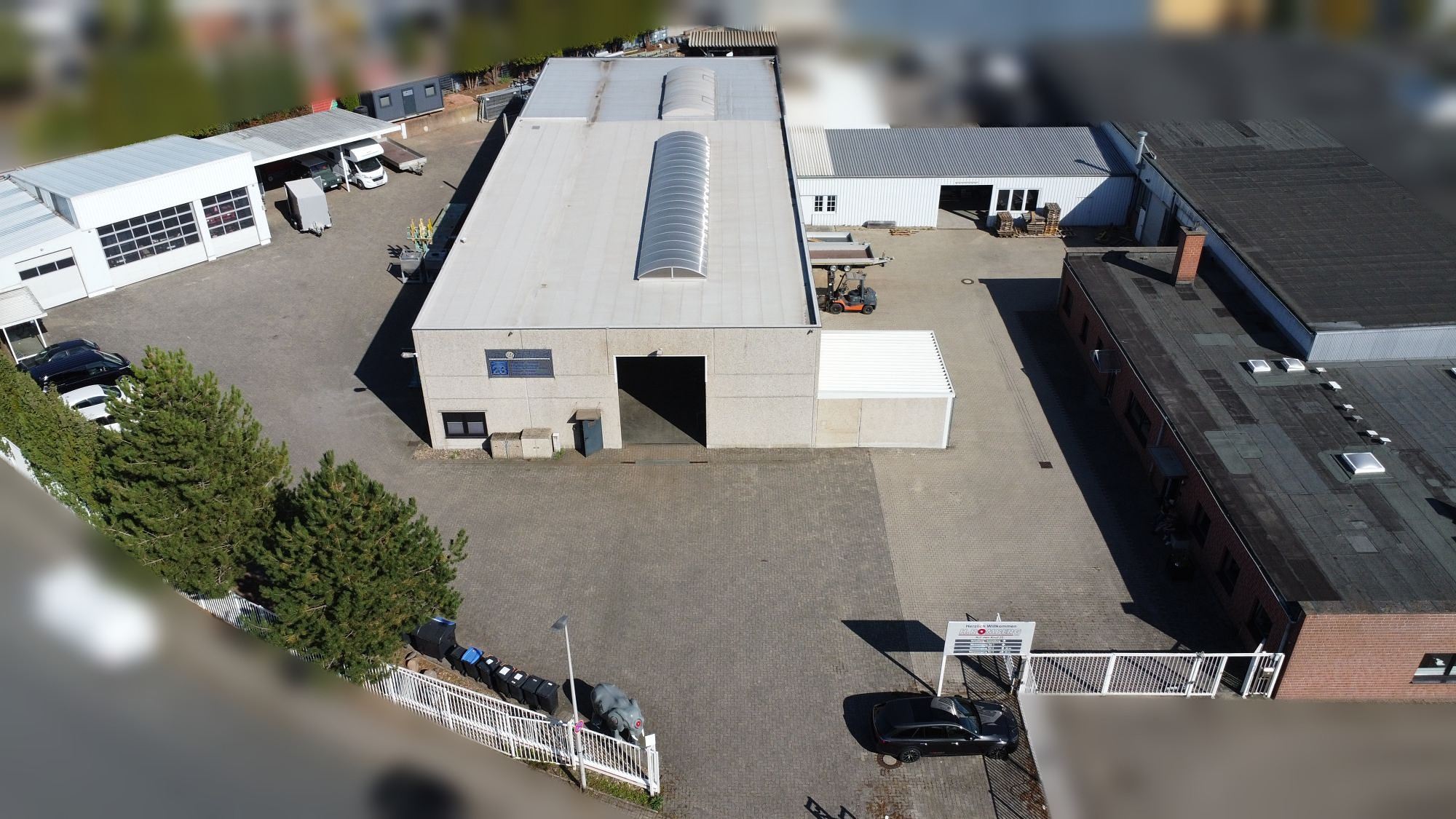 Luftbild des Firmengeländes der H. Romberg GmbH, Auf dem Knuf 23 in Hamm: Werkhalle, Hof und Einfahrt